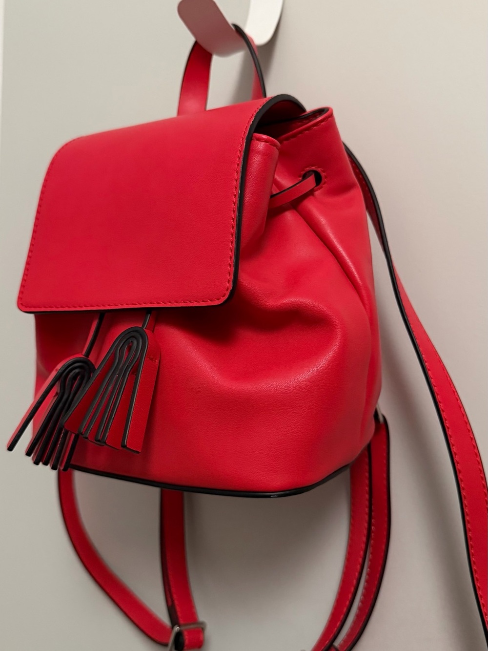 French Connection Cherry Red Faux Leather Tassel Mini Backpack - Picture 2 of 13